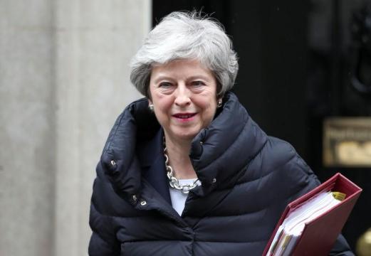 Britain's May should set resignation date next week: senior lawmaker