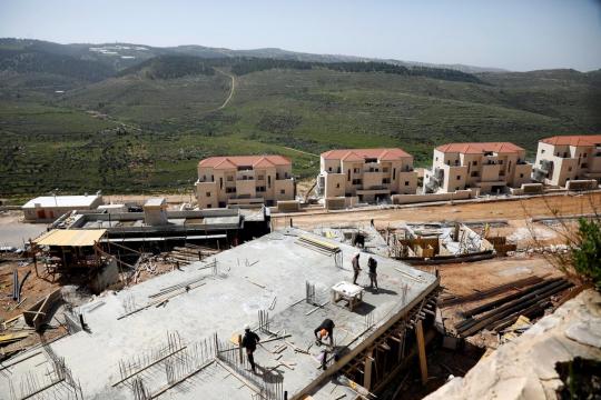 Israel approves new homes for settlers, Palestinians in West Bank