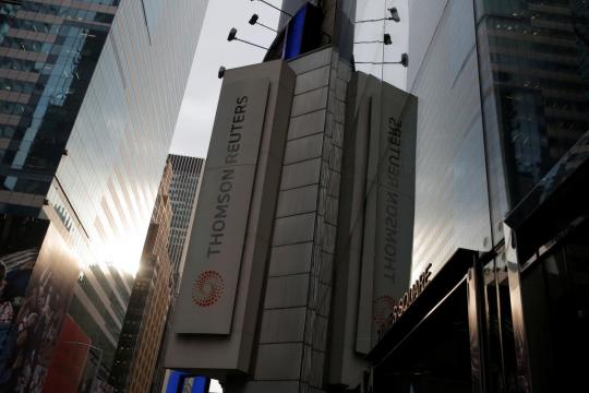 Thomson Reuters raises outlook, grows fastest since financial crisis