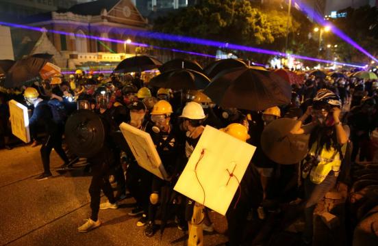 Hong Kong police fire tear gas as protests again roil the city