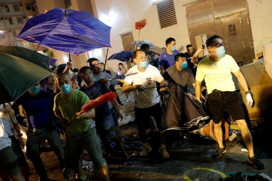 Hong Kong police fire tear gas as city is again roiled by protests