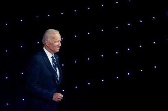 Biden mounts fierce defense of Obama legacy after debate attacks