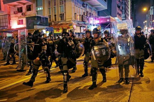 Hong Kong police make fresh arrests, city braces for further protests