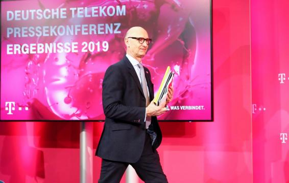 U.S. merger within reach, D.Telekom CEO goes on offensive