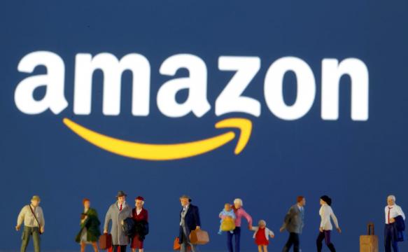 Exclusive: Amazon entices warehouse employees to grocery unit with higher pay