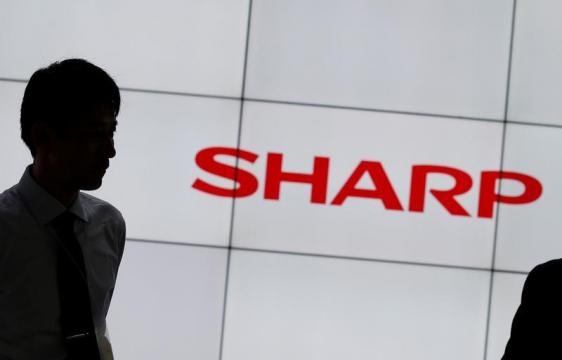 Japan's Sharp halves full-year profit forecast as virus hits tech demand