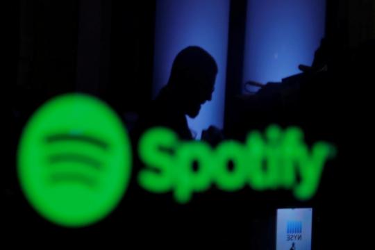 Spotify new home for Joe Rogan's podcast, shares jump