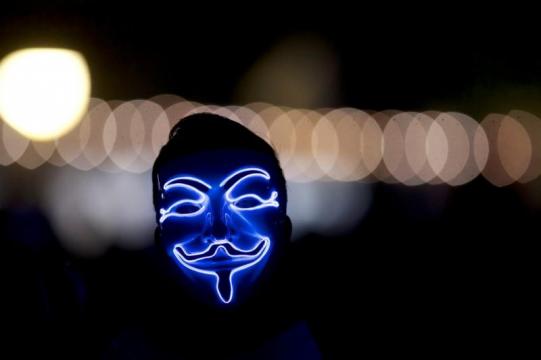 Hackers and hucksters reinvigorate 'Anonymous' brand amid protests