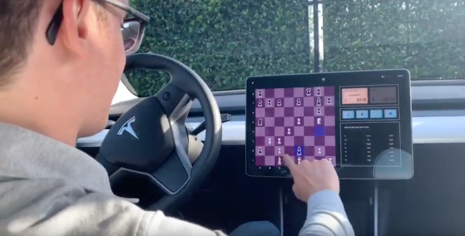 Watch a Tesla Model 3 play chess against the top-ranked player in the U.S.