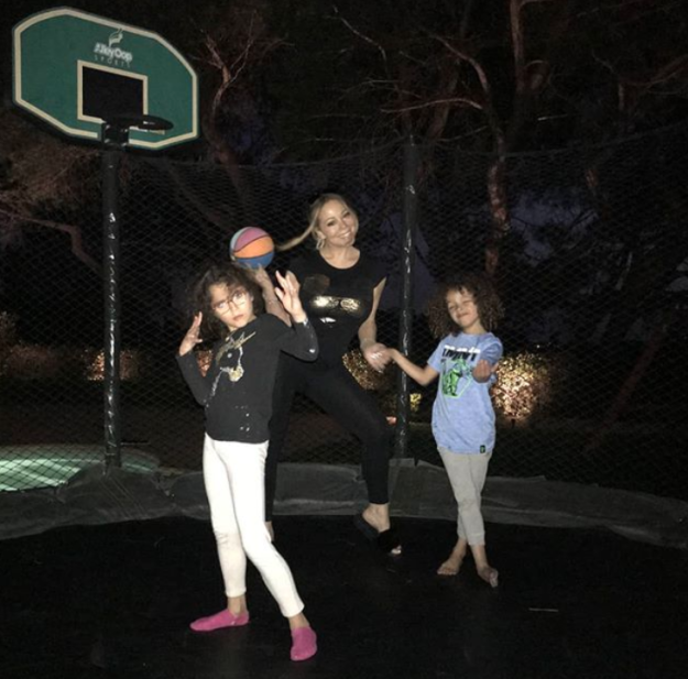 Mariah Carey and her kids trampolined.
