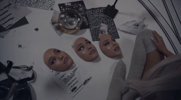 However, there are a couple of other interesting details which might give us some clues about her upcoming album. Going back to the scene with the masks, it's interesting to note that there are three, perhaps representing each of her past albums.
