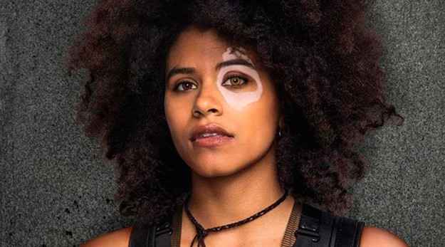 For those ~not in the know~ Domino is a mutant known for her incredible luck and the signature birthmark over her eye (making her look like a domino, hence the name).