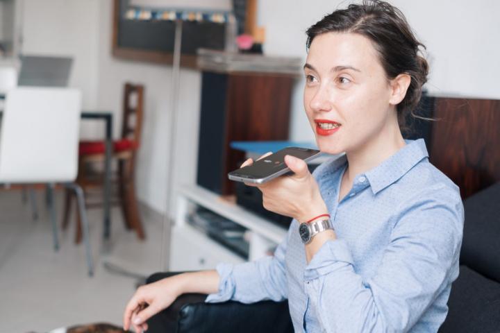 woman-using-voice-assistant-on-smartphone-1024x683.jpg