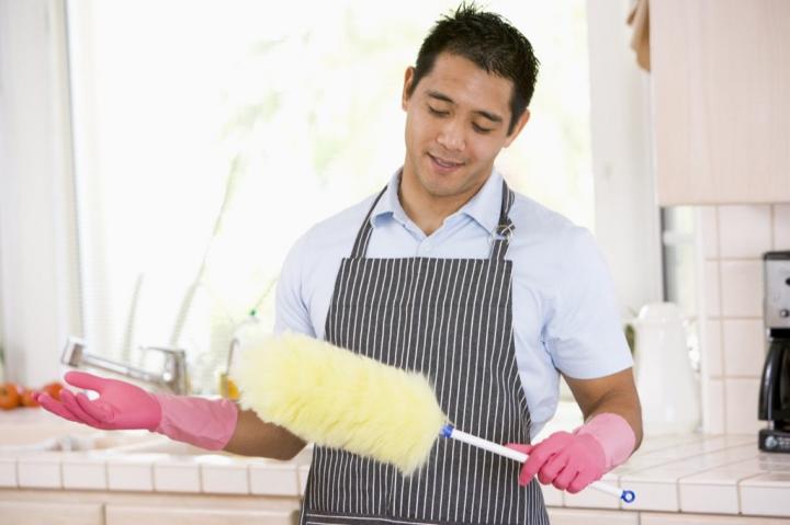 man-with-cleaning-supplies-and-apron-1024x682.jpg