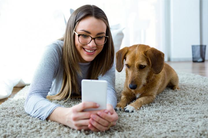 girl-with-dog-in-dorm-1024x683.jpg