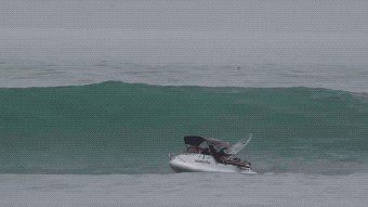 waves-eating-boats-for-breakfast-19-gifs-1825.jpg?quality=85&strip=info