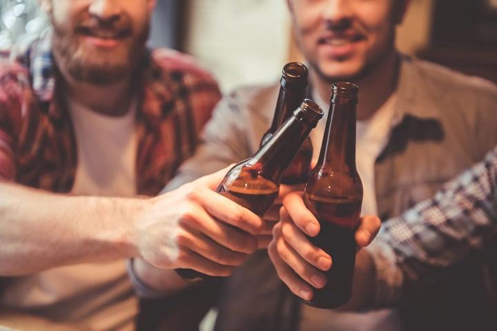 group-of-men-friends-clinkingbeer-bottles-1024x683.jpg