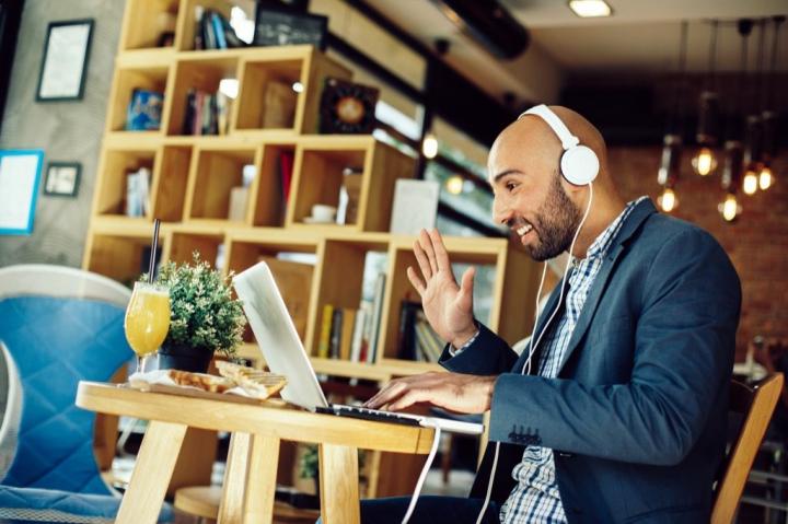 man-in-cafe-on-laptop-skype-facetime-long-distance-relationships-1024x682.jpg