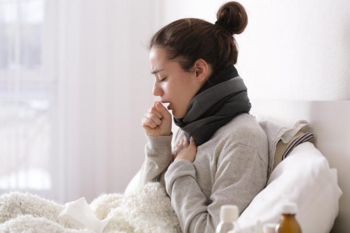 Woman-Coughing-in-Bed-1024x683.jpg?resize=1024%2C683&ssl=1