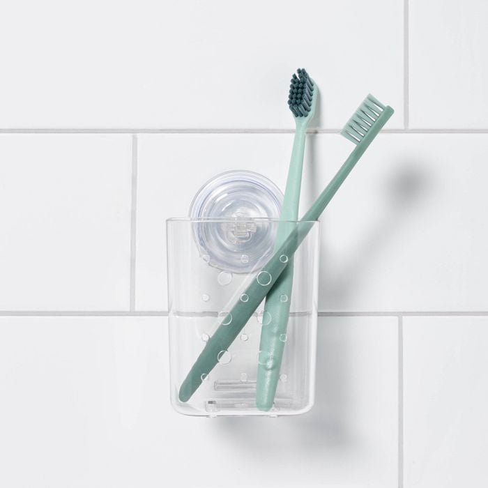 Small-Space-Game-Changer-Room-Essentials-Suction-Toothbrush-Holder.jpg