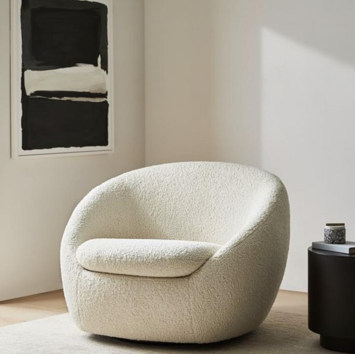 Comfy-Seat-West-Elm-Cozy-Swivel-Chair.png