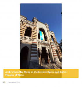 A-Ukrainian-flag-flying-at-the-historic-Opera-and-Ballet-Theater-of-Tbilisi-282x300.png
