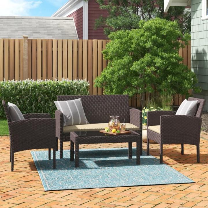 Lark-Manor-Hogans-WickerRattan-4-Person-Seating-Group-with-Cushions.webp