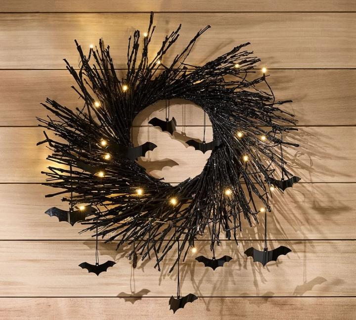 Black-Wreath-Pre-Lit-Black-Glitter-Branch-Wreath-with-Bats.jpg