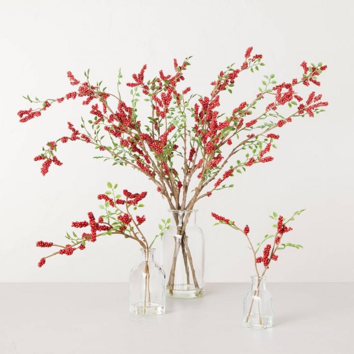 Red-Accents-Hearth-Hand-with-Magnolia-Faux-Winterberry-Stems-Glass-Bottle-Arrangement.jpg