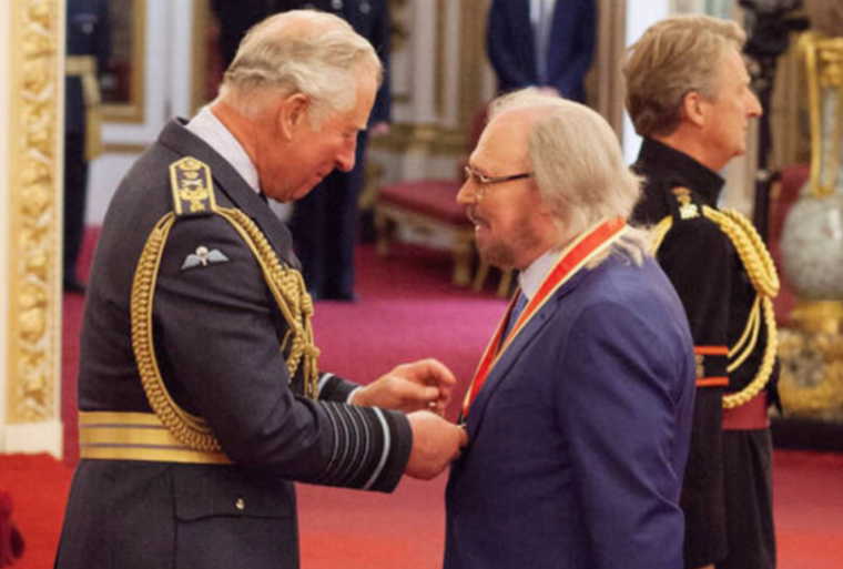 Bee Gees’ Barry Gibb officially knighted by Prince Charles