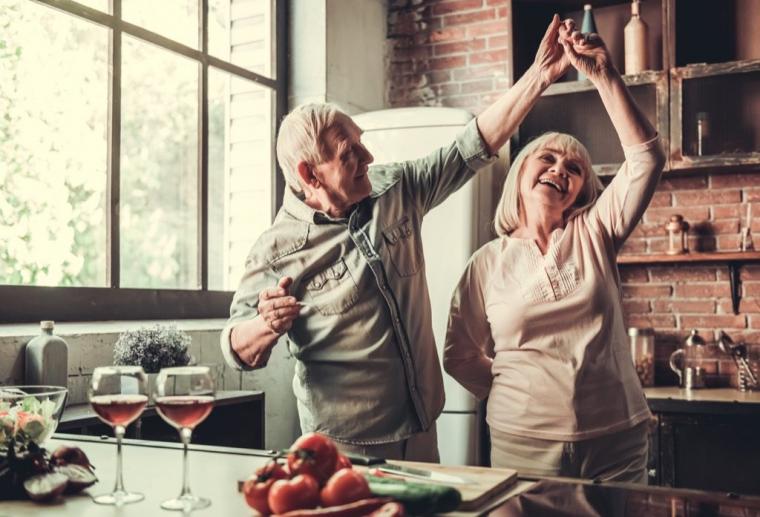 elderly-couple-dancing-in-kitchen-1024x697.jpg