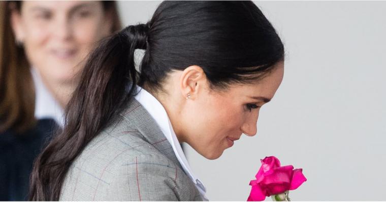 Meghan Markle Ditched Her Signature Messy Bun For a Rare Ponytail While on the Royal Tour