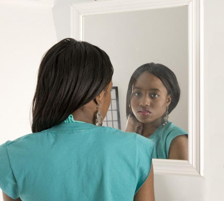 sad-woman-looking-in-a-mirror-1024x917.jpg