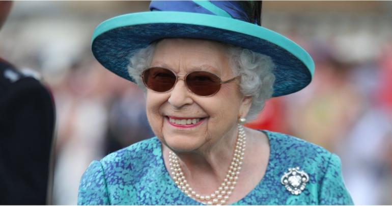 The Queen Sporting Sunglasses and an Umbrella Is the Most British Thing Ever