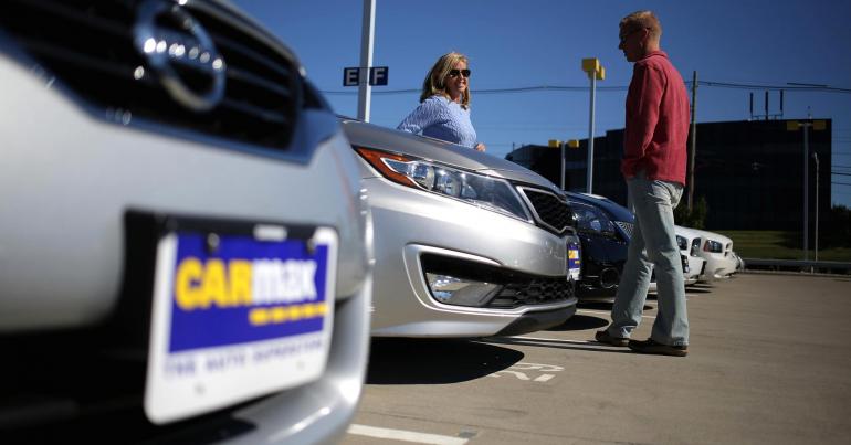 CarMax shares surge to record high, on pace for their best day in 4 years