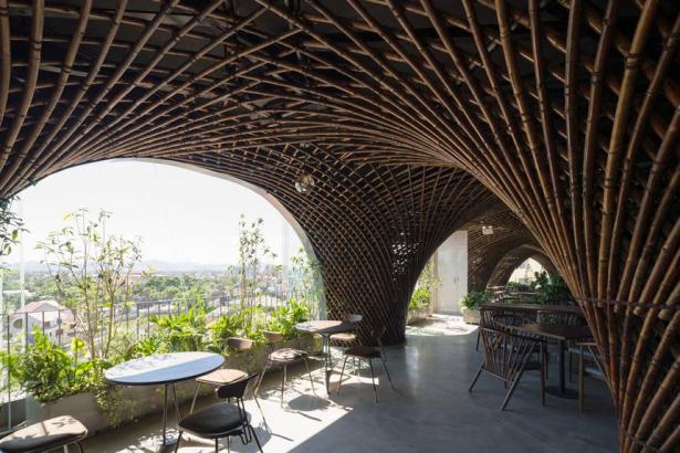 Dome and curved walls of bamboo renew this open-air cafe
