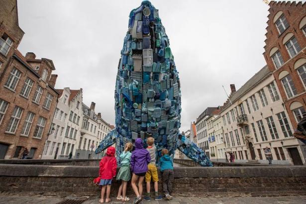 Whale made with 10,000 lbs. of plastic waste emerges from canal (Video)