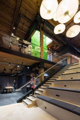 Industrial warehouse converted into open workplace with no private offices