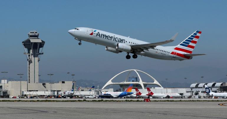 Airline stocks tumble after American trims revenue outlook