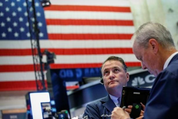 Stocks slide on trade war worries; oil, metals fall