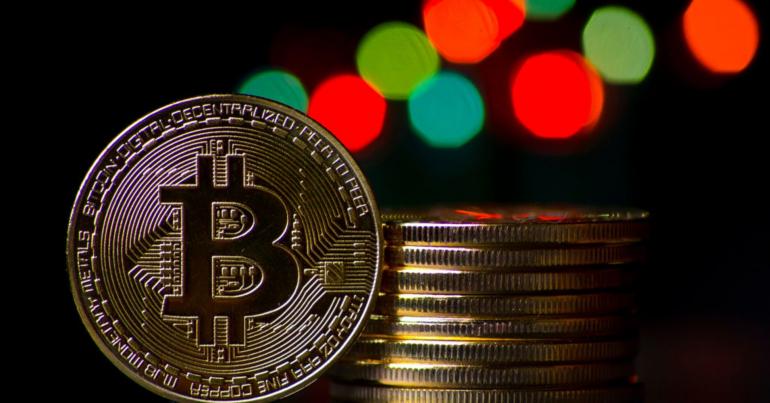 Bitcoin edges past $8,000, notching a two-month high