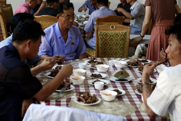 North Koreans eat dog meat to beat summer heat