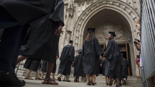 Despite record student debt, Americans still bet on college