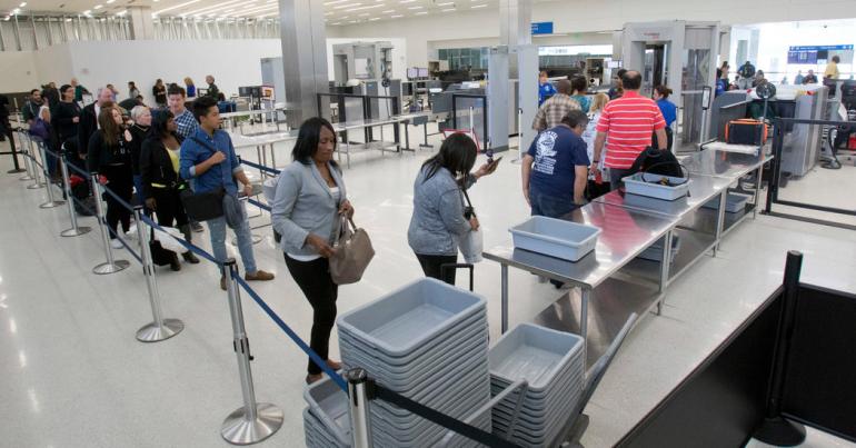 Airport Security Trays Carry More Cold Germs Than Toilets, Study Finds