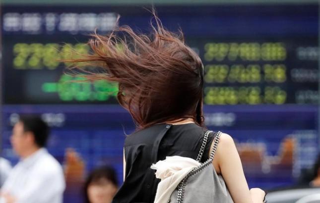 Asian shares on slippery slope as trade tensions take toll