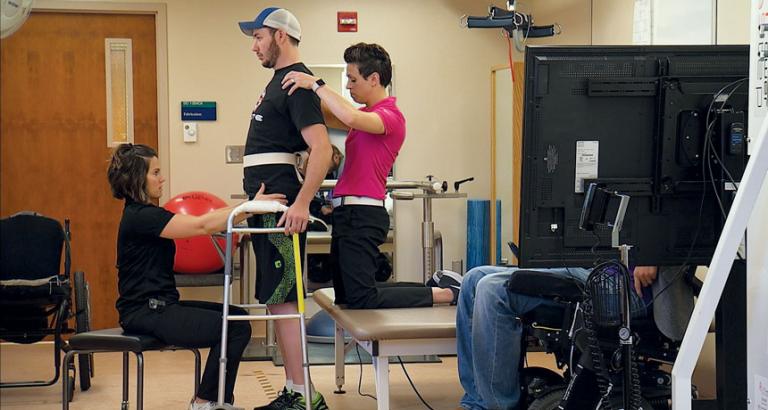 A paralyzed man makes great strides with spinal stimulation and rehab