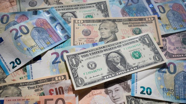 Currencies: British pound rallies after wage data, dollar traders await Treasury report