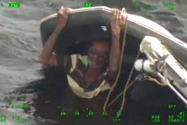 Man rescued after clinging to capsized boat for nearly 20 hours