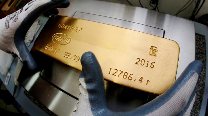 Metals Stocks: Gold secures weekly gain as dollar slips, stocks trade mixed