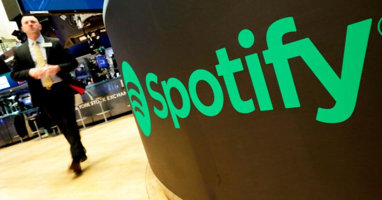 Music streaming leader Spotify reports a modest rise in paid users